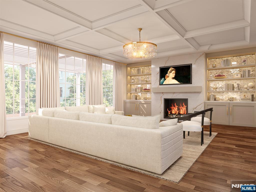 37 Roberts Road Englewood Cliffs, NJ 07632 - Photo 6 of 17 a living room with furniture a fireplace and a flat screen tv