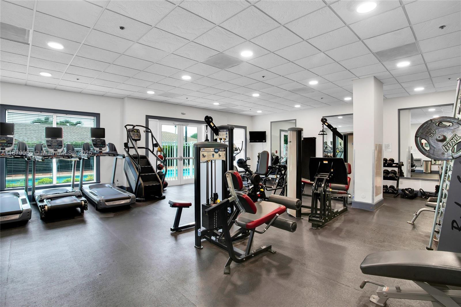 2665 Southwest 37th Avenue, Unit 512 Miami, FL 33133 - Photo 12 of 17 a view of a room with gym equipment