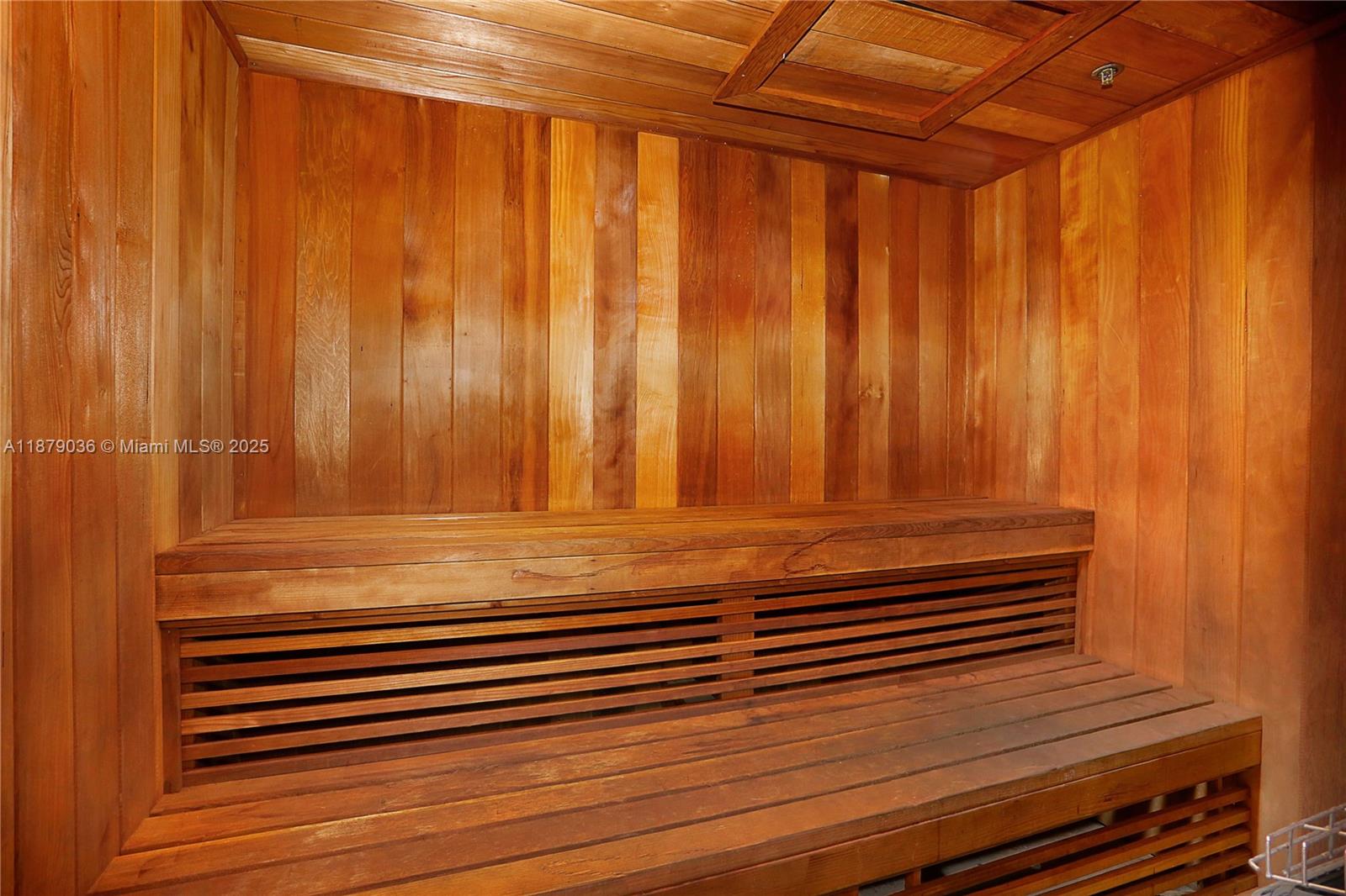 2665 Southwest 37th Avenue, Unit 512 Miami, FL 33133 - Photo 13 of 17 a view of a room with wooden walls