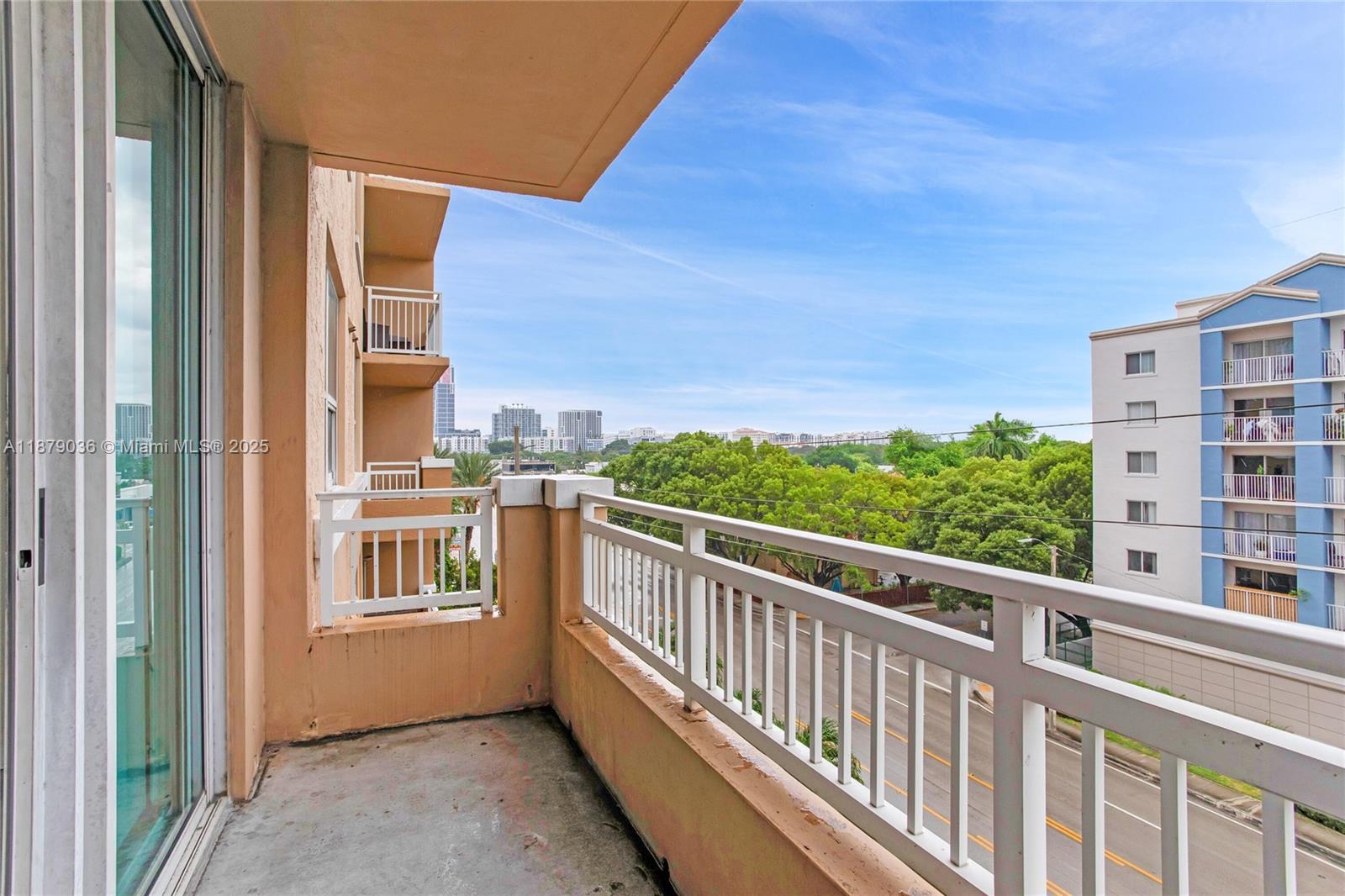 2665 Southwest 37th Avenue, Unit 512 Miami, FL 33133 - Photo 9 of 17 a view of balcony with furniture