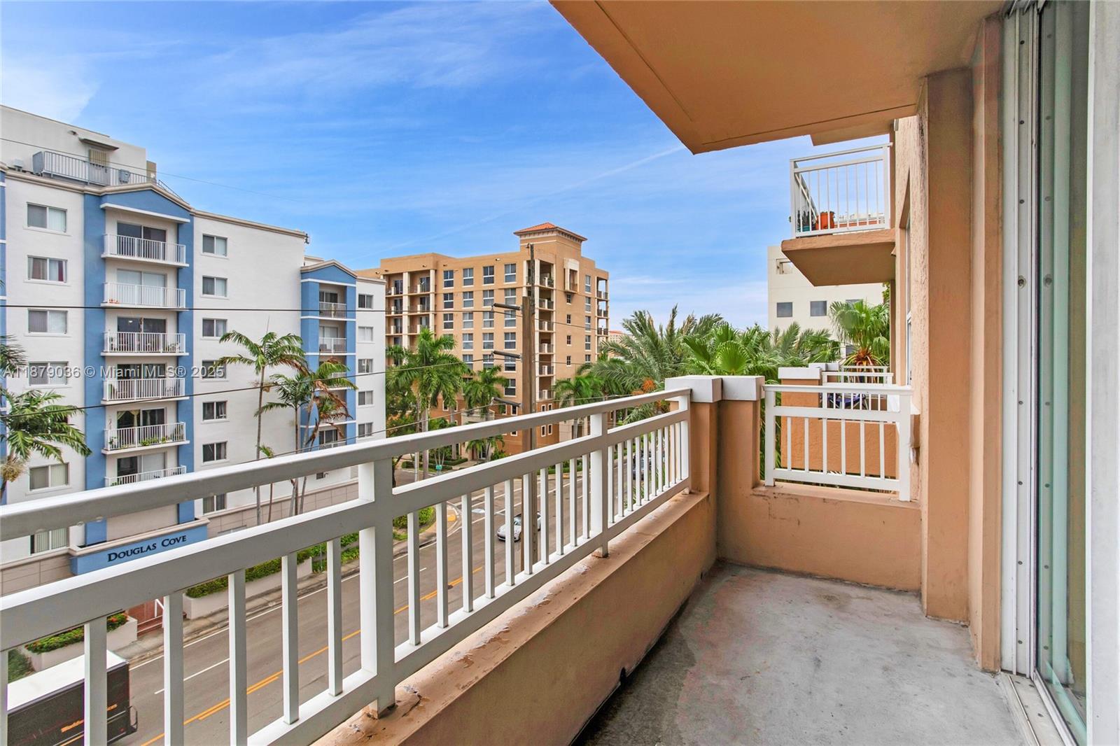 2665 Southwest 37th Avenue, Unit 512 Miami, FL 33133 - Photo 10 of 17 a view of a building from a balcony