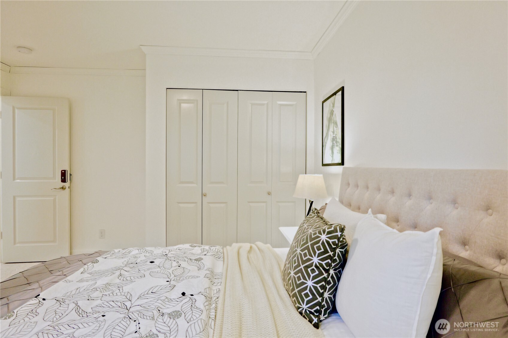 12008 Northeast 162nd Place Bothell, WA 98011 - Photo 27 of 35 a bedroom with a bed and a window