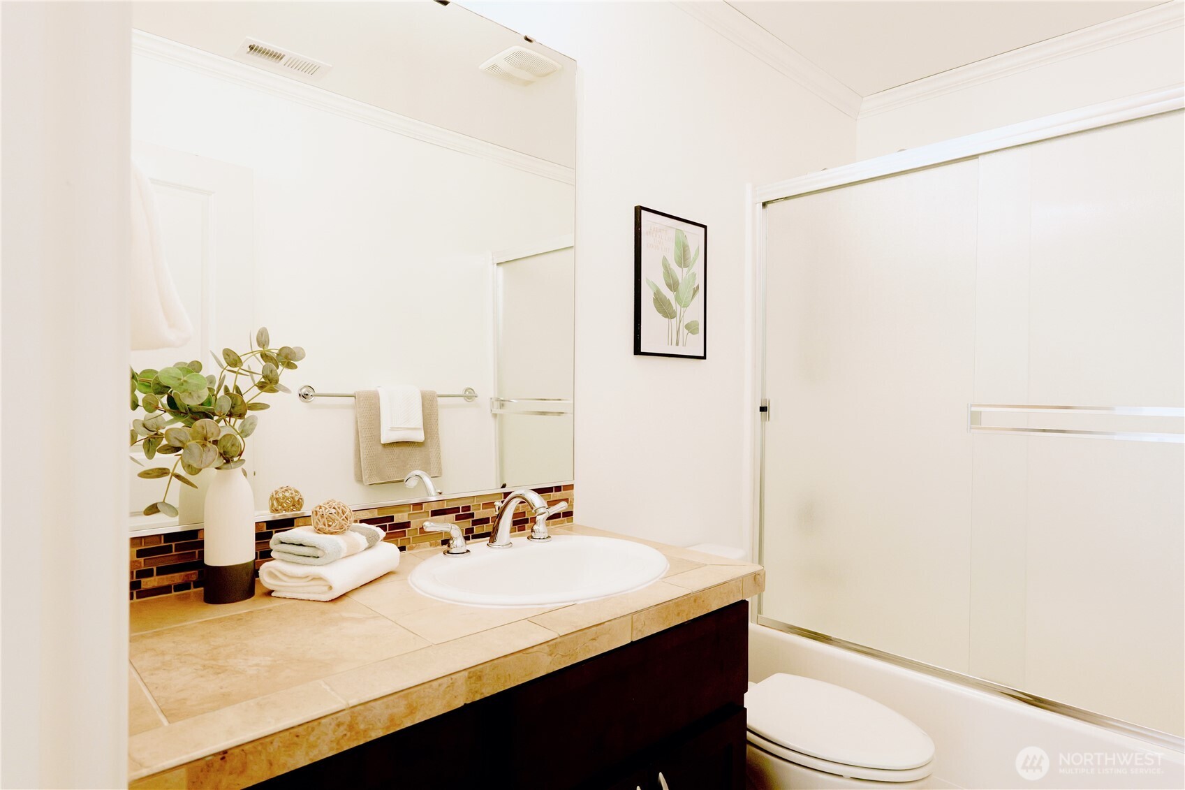 12008 Northeast 162nd Place Bothell, WA 98011 - Photo 29 of 35 a bathroom with a sink a toilet and mirror