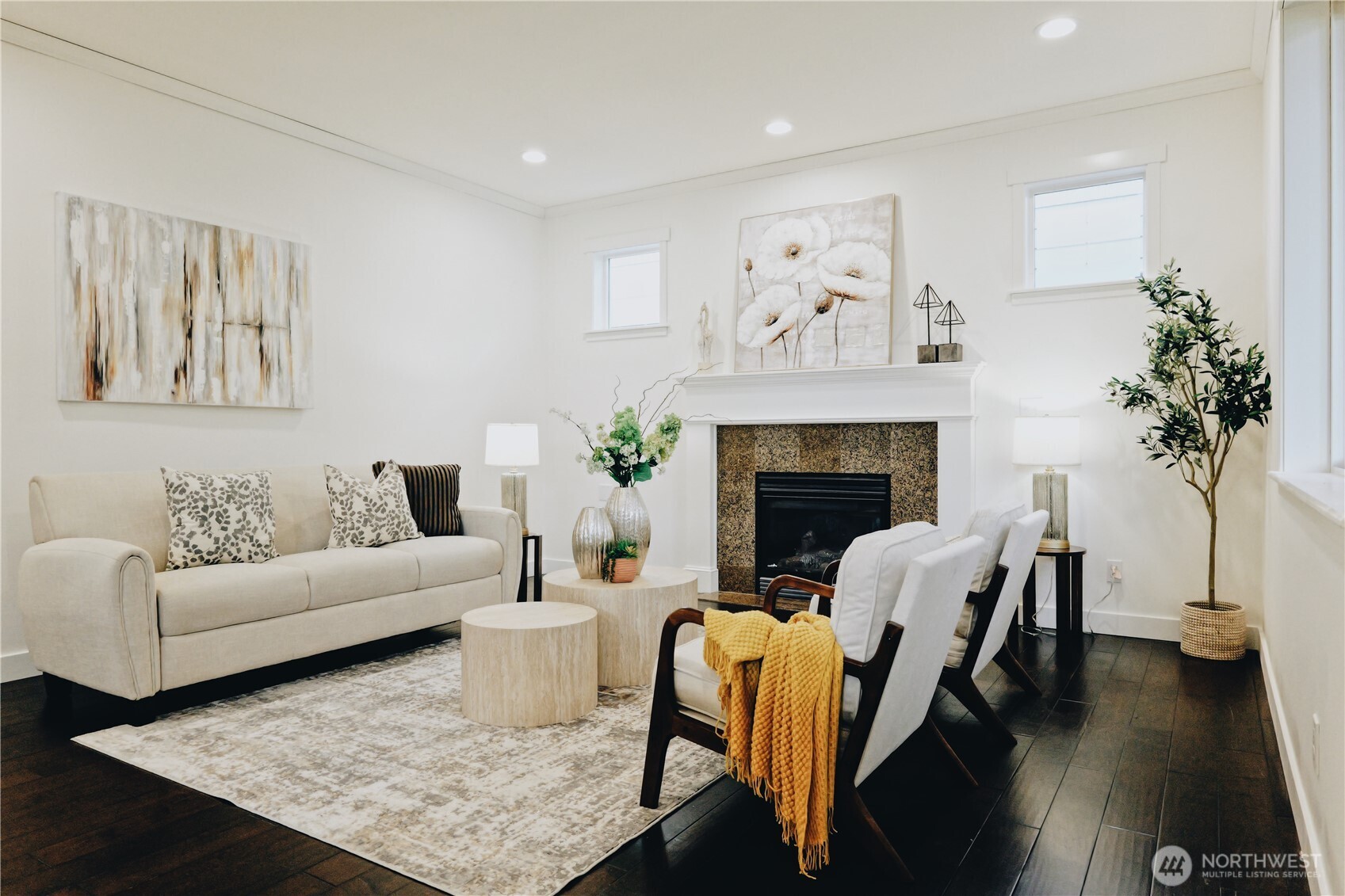 12008 Northeast 162nd Place Bothell, WA 98011 - Photo 10 of 35 a living room with furniture and a fireplace