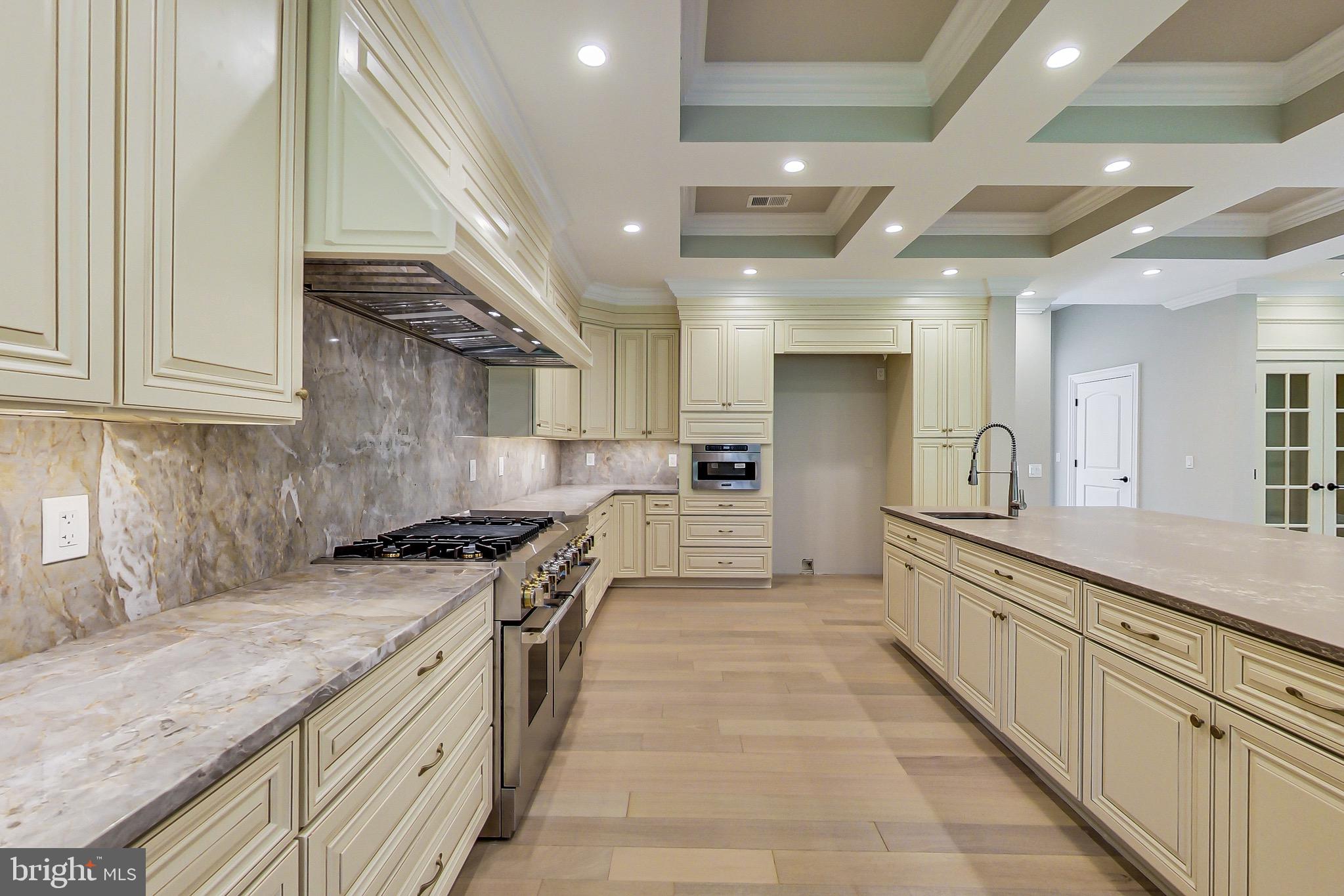 3104 Sleepy Hollow Road Falls Church, VA 22042 - Photo 13 of 89 a large kitchen with stainless steel appliances granite countertop a sink and cabinets