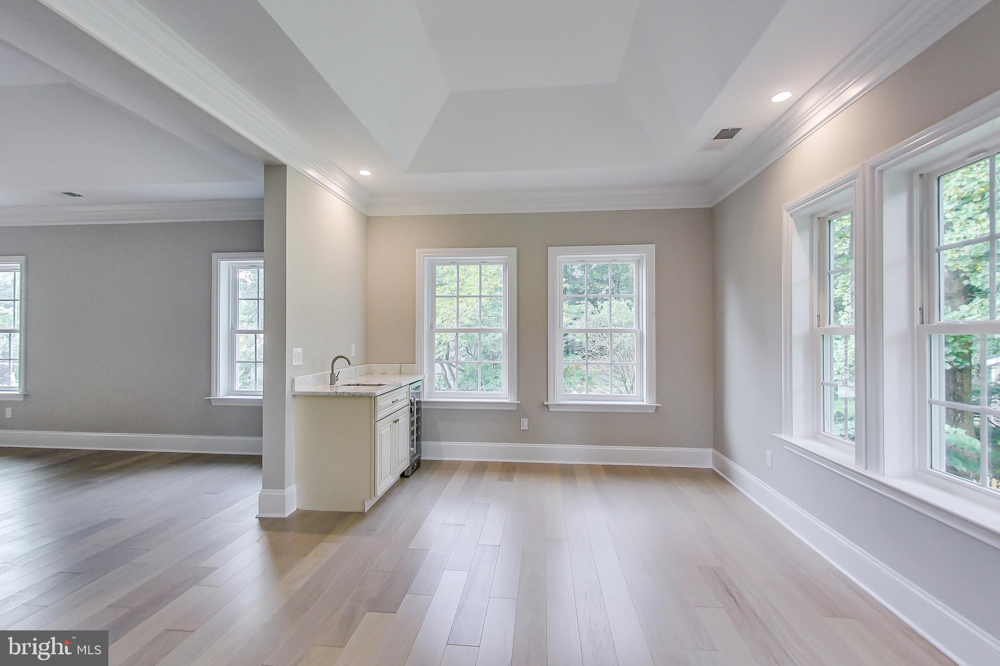 3104 Sleepy Hollow Road Falls Church, VA 22042 - Photo 18 of 89 an empty room with wooden floor and windows
