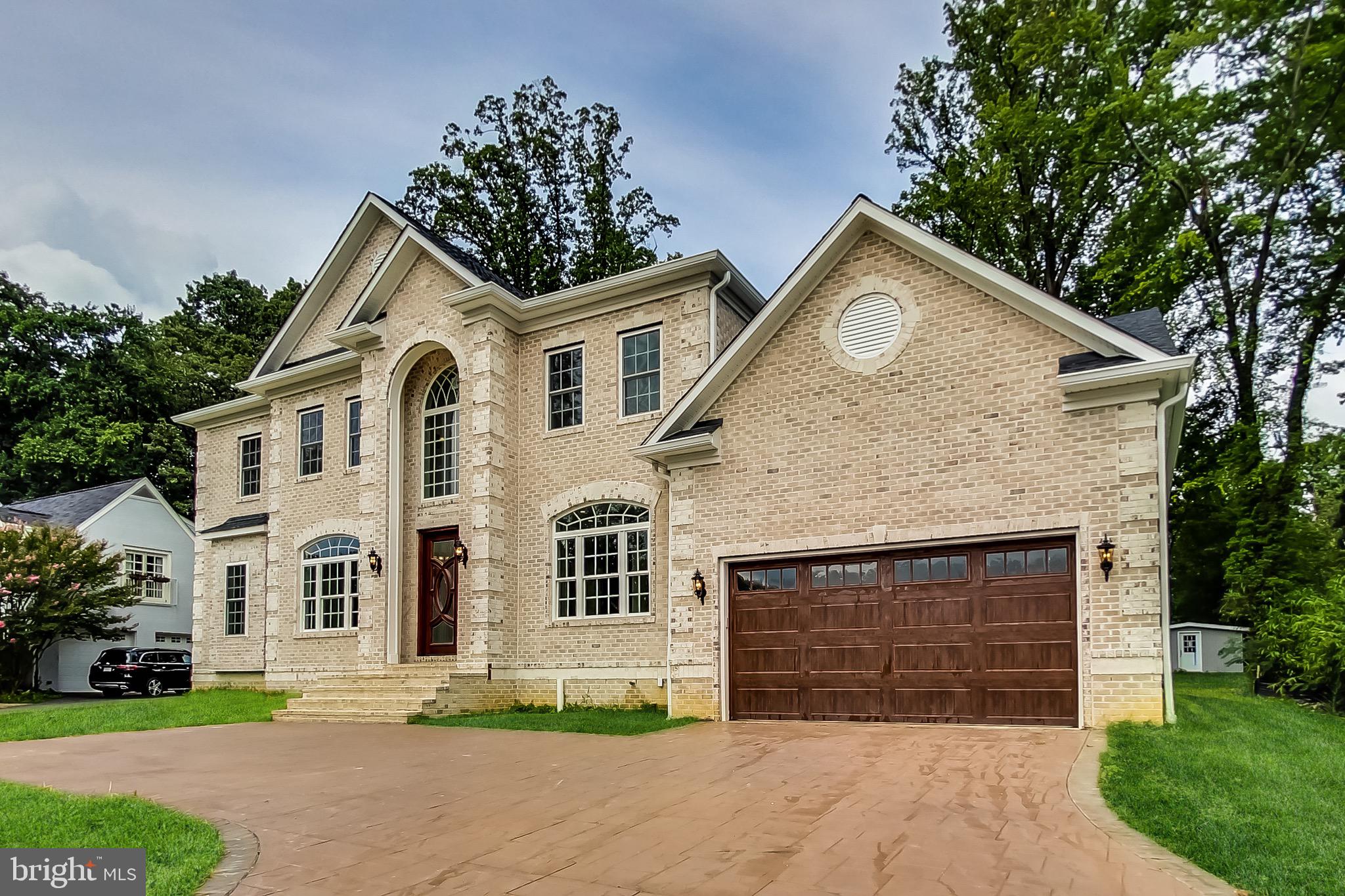 3104 Sleepy Hollow Road Falls Church, VA 22042 - Photo 2 of 89 a front view of a house with a garden