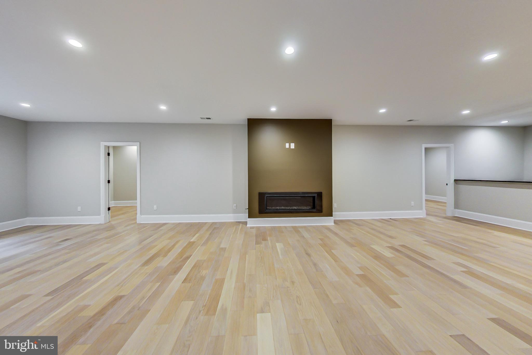3104 Sleepy Hollow Road Falls Church, VA 22042 - Photo 21 of 89 a view of an empty room with wooden floor and closet