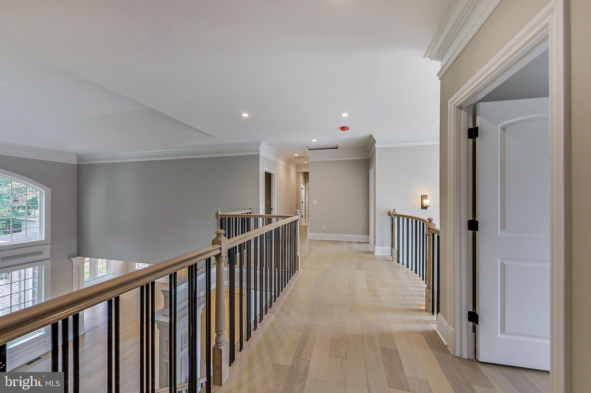 3104 Sleepy Hollow Road Falls Church, VA 22042 - Photo 23 of 89 a view of a hallway with wooden floor and windows