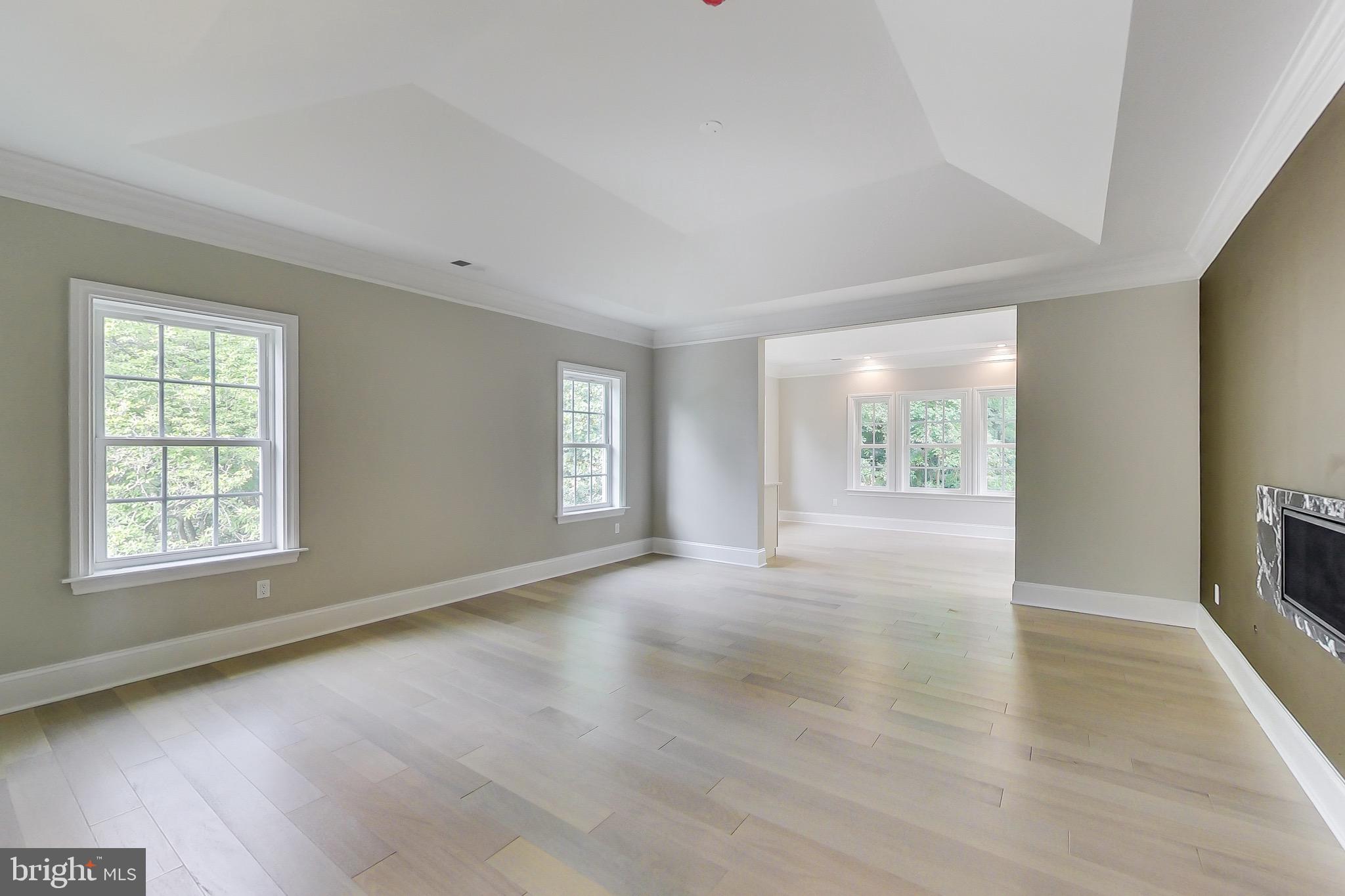 3104 Sleepy Hollow Road Falls Church, VA 22042 - Photo 24 of 89 a view of an empty room with a window and wooden floor