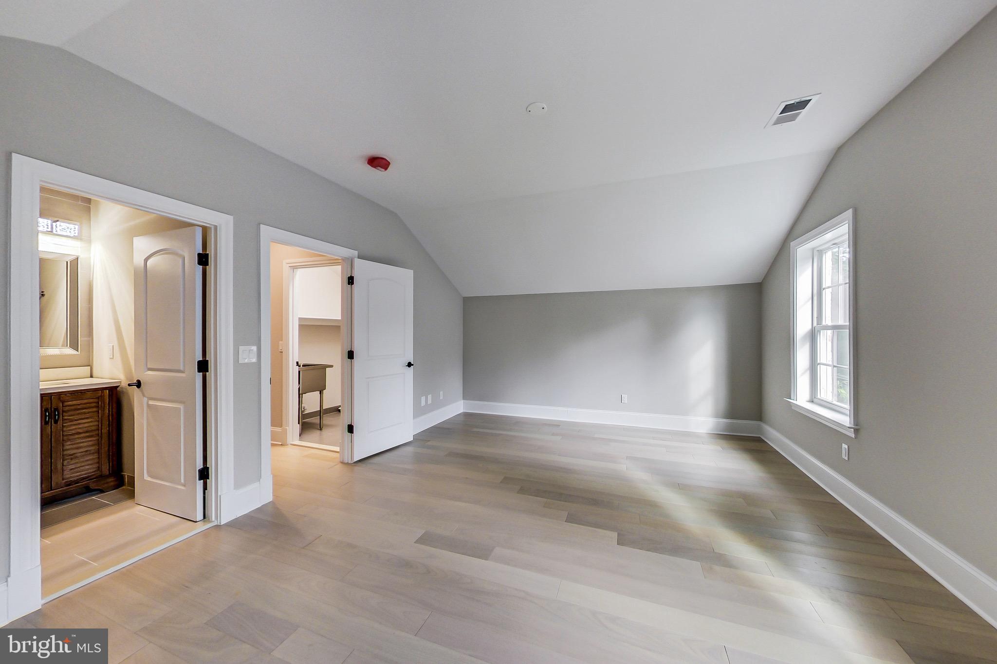 3104 Sleepy Hollow Road Falls Church, VA 22042 - Photo 27 of 89 wooden floor in an empty room with a window