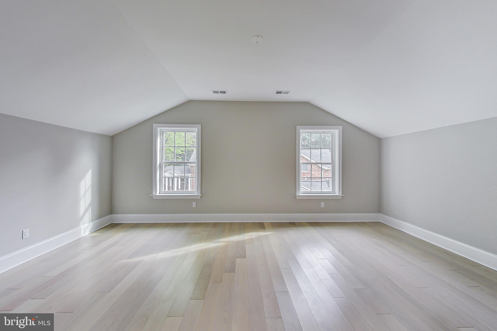 3104 Sleepy Hollow Road Falls Church, VA 22042 - Photo 30 of 89 an empty room with wooden floor and windows
