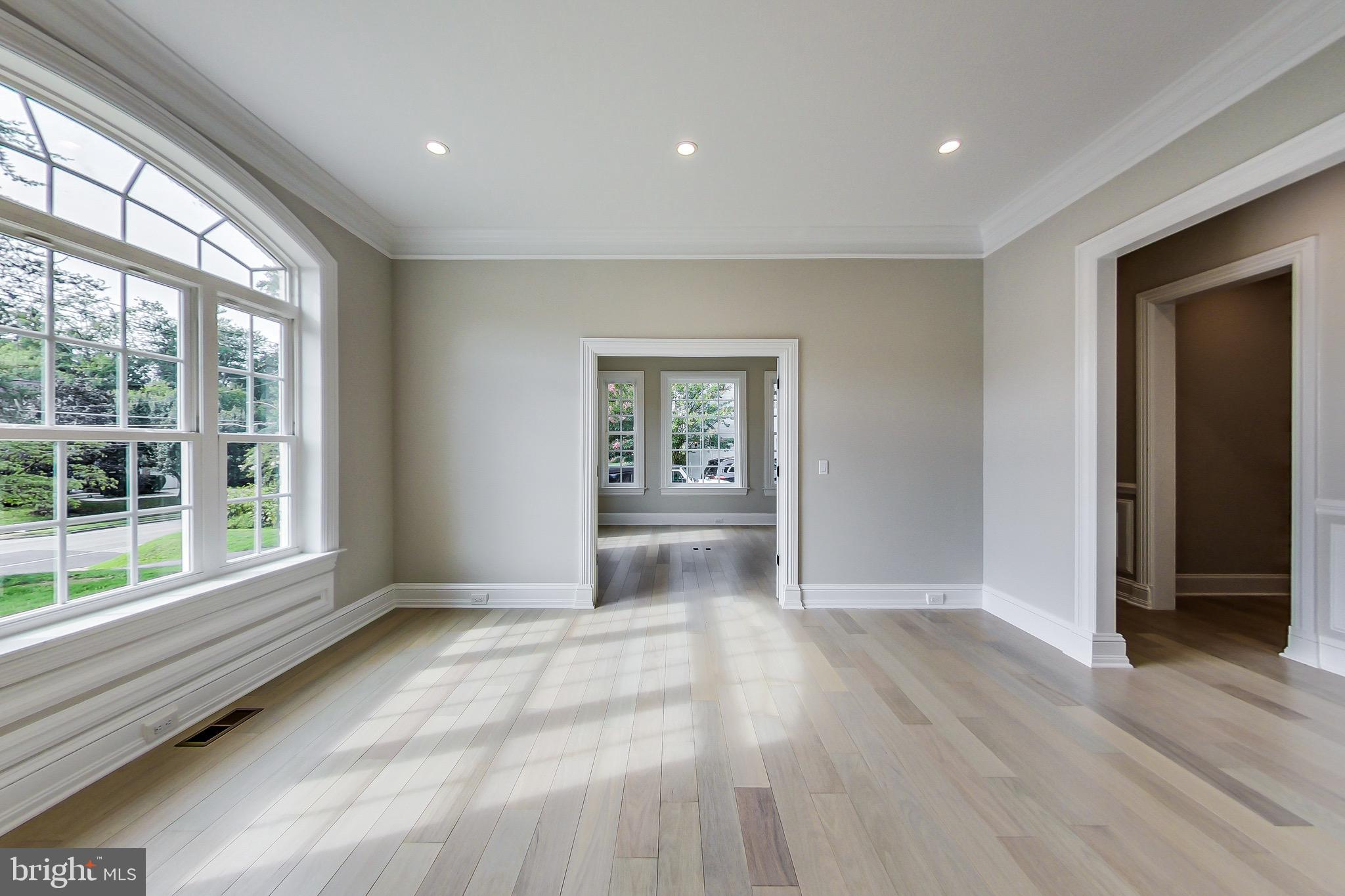 3104 Sleepy Hollow Road Falls Church, VA 22042 - Photo 39 of 89 a view of an empty room with wooden floor and a window