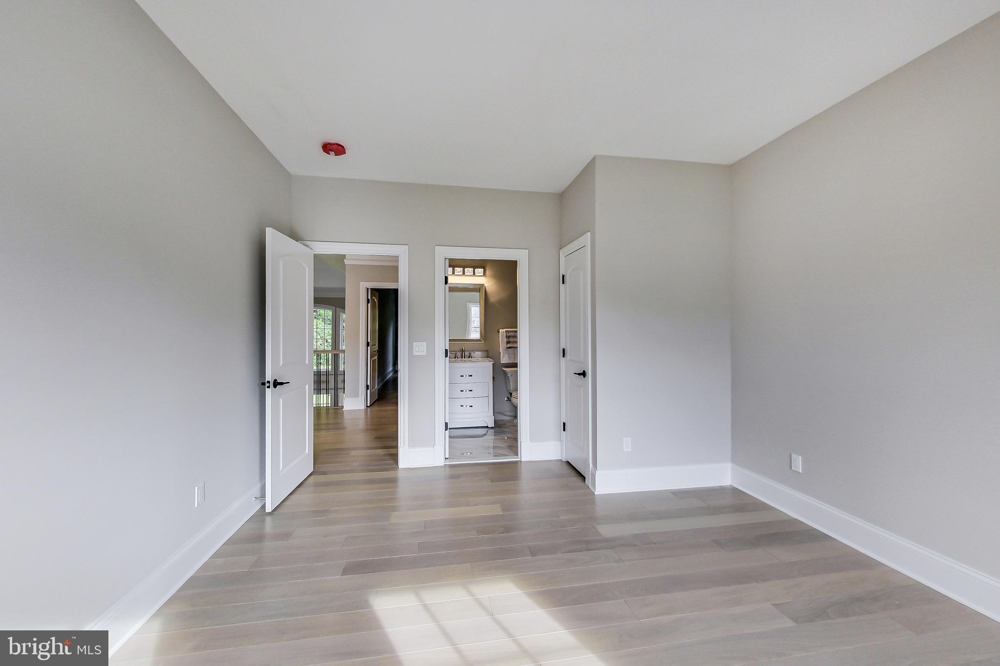 3104 Sleepy Hollow Road Falls Church, VA 22042 - Photo 43 of 89 a view of a hallway with wooden floor and closet