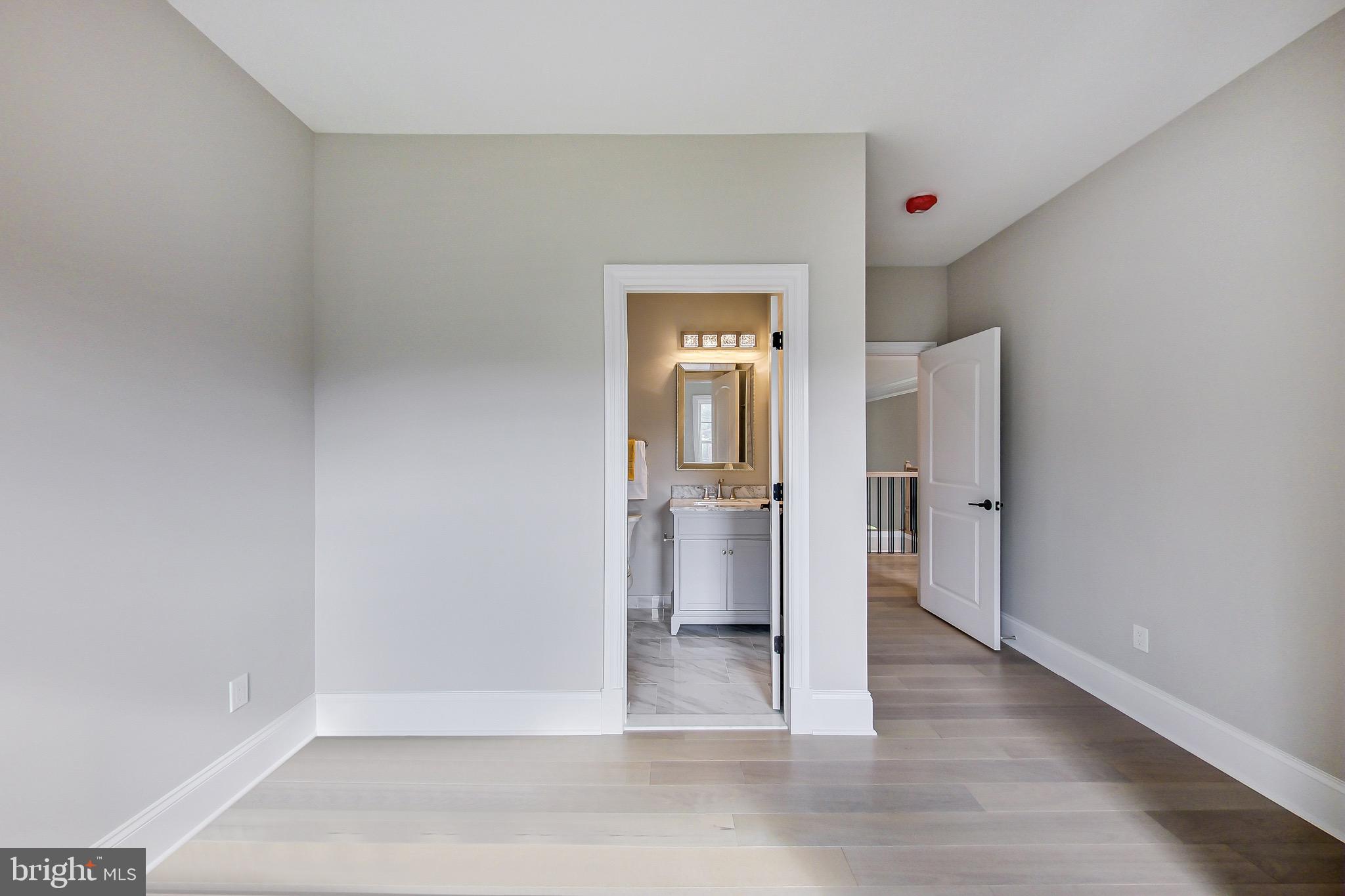 3104 Sleepy Hollow Road Falls Church, VA 22042 - Photo 44 of 89 a view of a hallway with wooden floor