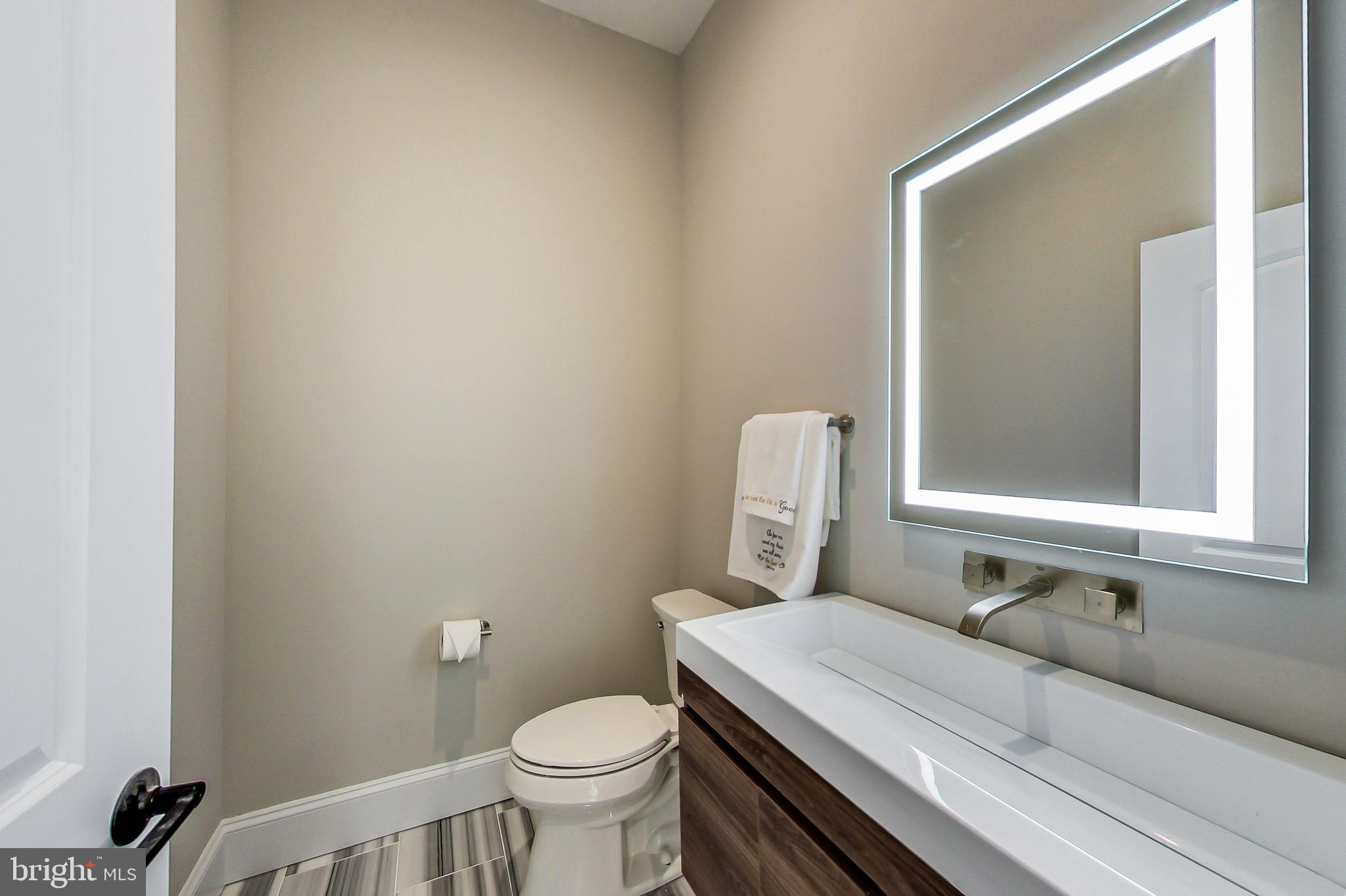 3104 Sleepy Hollow Road Falls Church, VA 22042 - Photo 45 of 89 a bathroom with a sink and a toilet