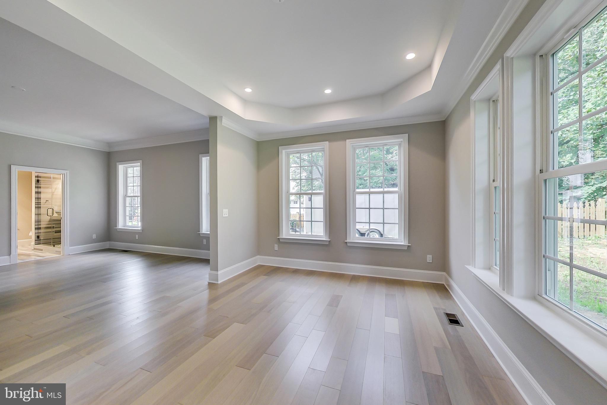 3104 Sleepy Hollow Road Falls Church, VA 22042 - Photo 52 of 89 a view of an empty room with wooden floor and a window