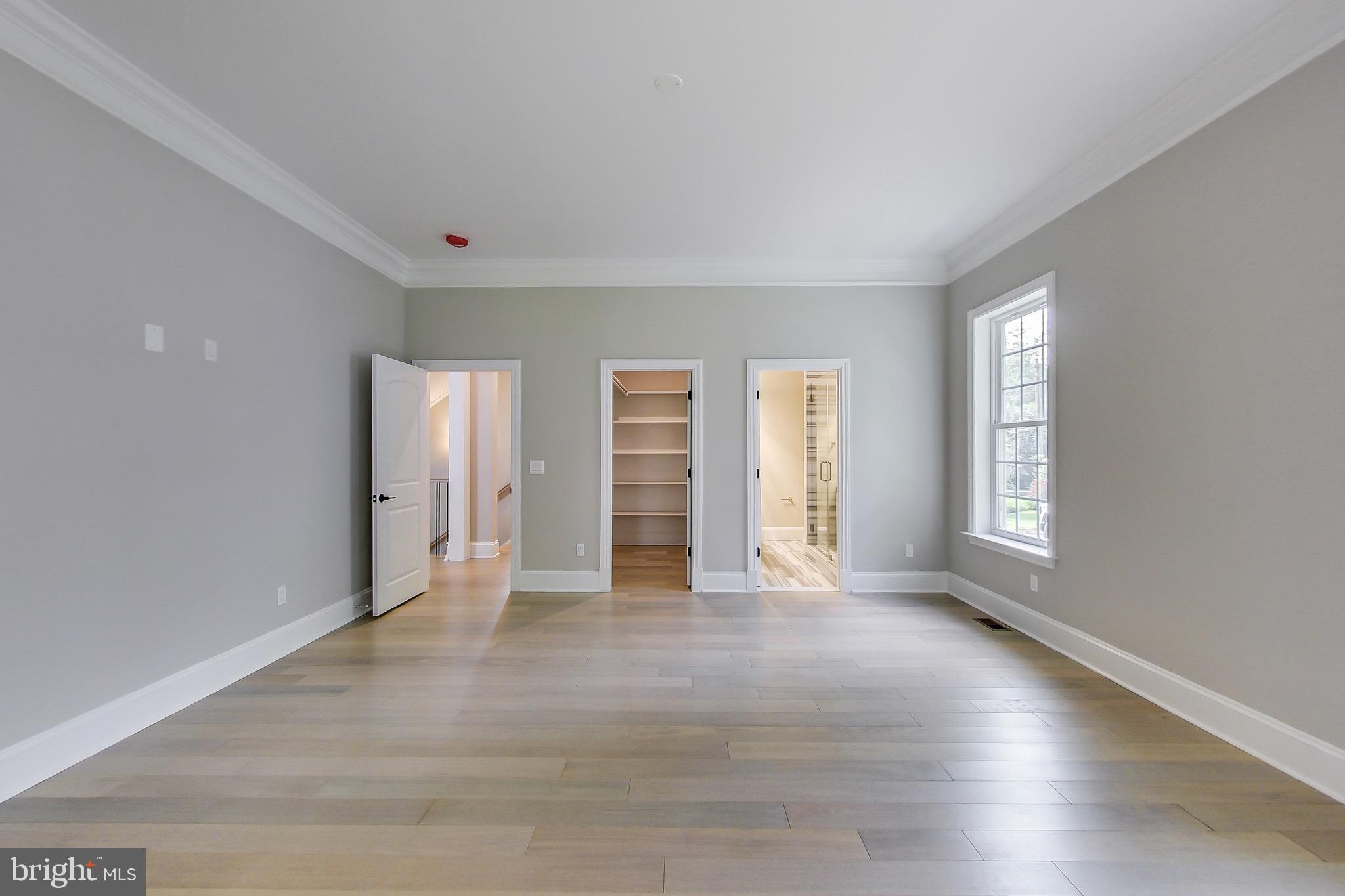 3104 Sleepy Hollow Road Falls Church, VA 22042 - Photo 57 of 89 an empty room with wooden floor and window