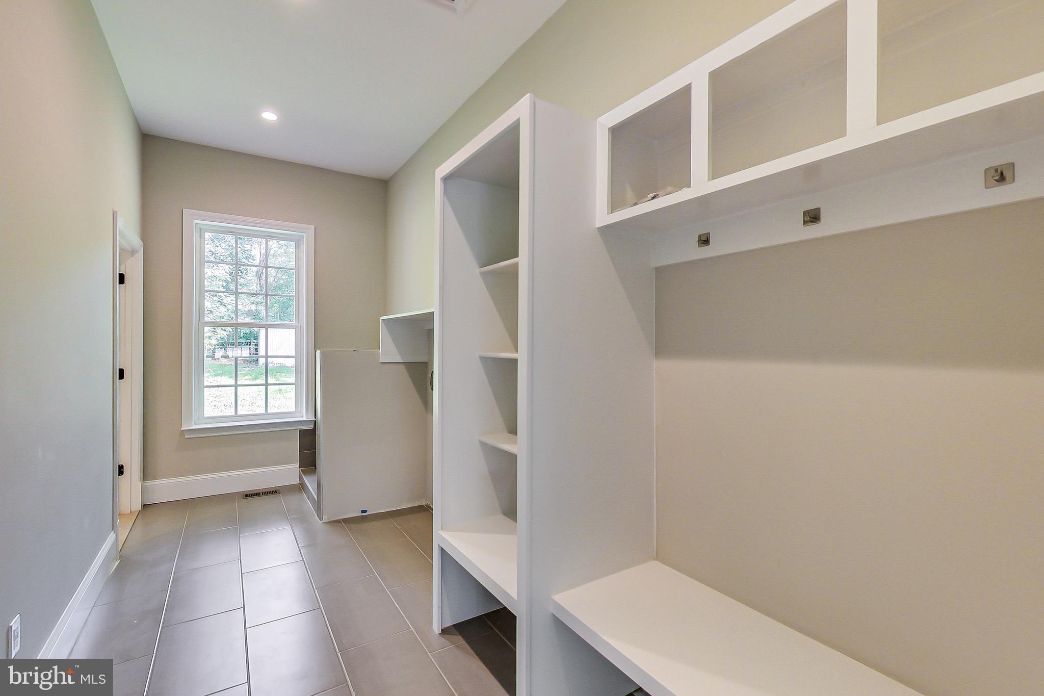 3104 Sleepy Hollow Road Falls Church, VA 22042 - Photo 61 of 89 a view of hallway with stairs and wooden floor