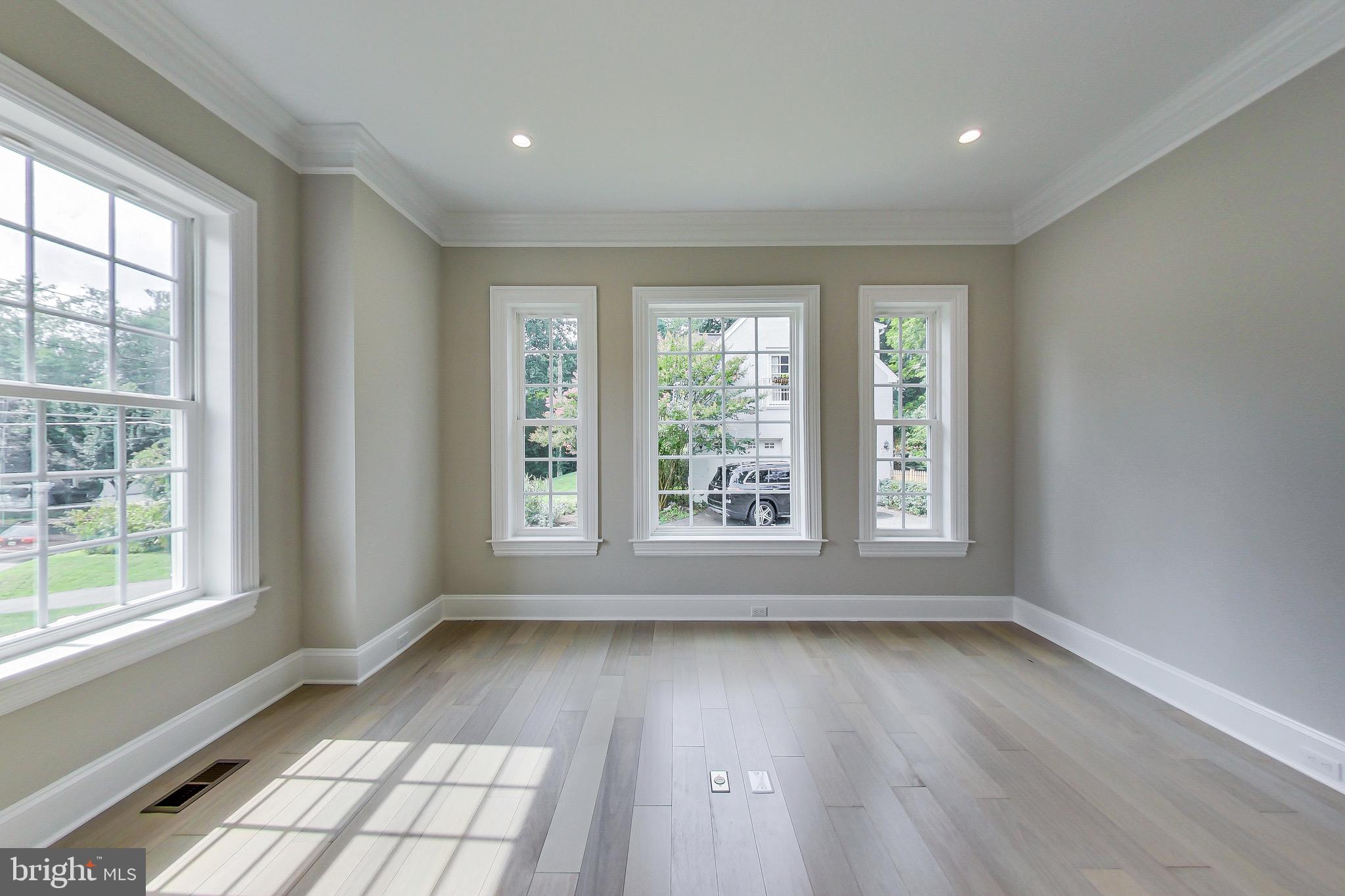 3104 Sleepy Hollow Road Falls Church, VA 22042 - Photo 62 of 89 a view of an empty room with a window and wooden floor
