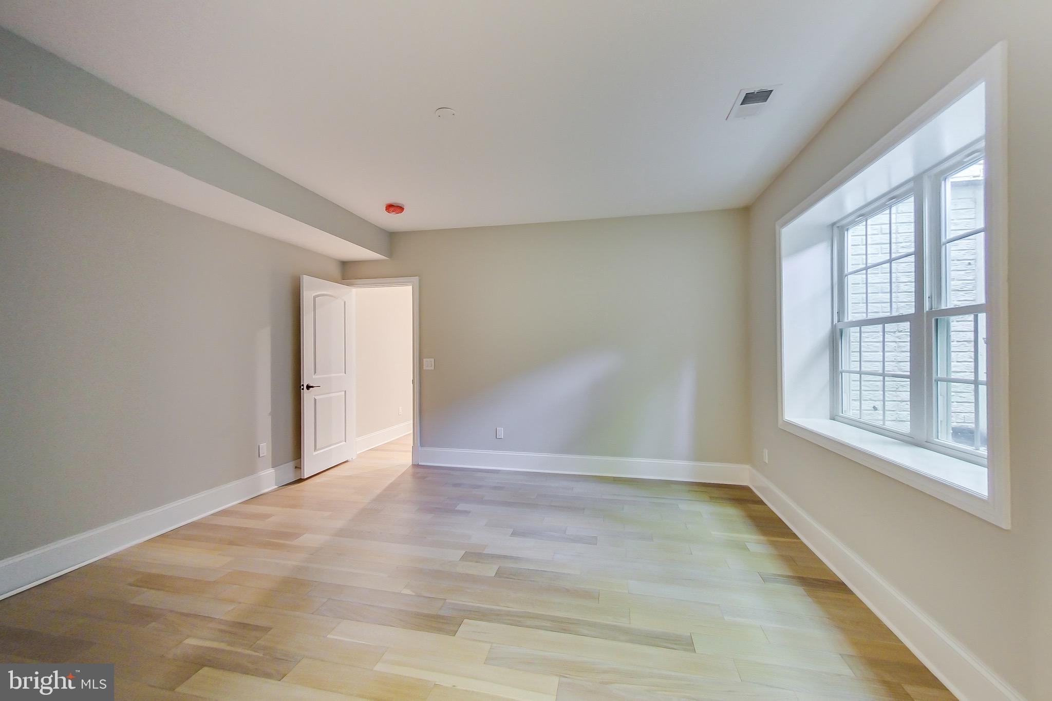 3104 Sleepy Hollow Road Falls Church, VA 22042 - Photo 80 of 89 a view of an empty room with a window