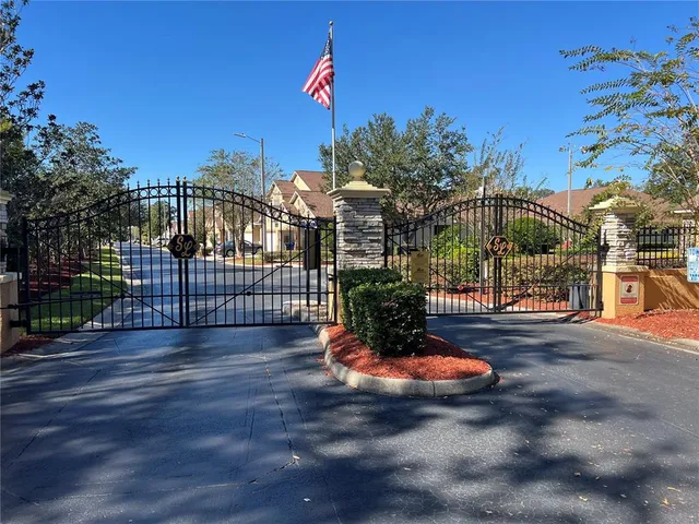 a view of a street with a building in the background