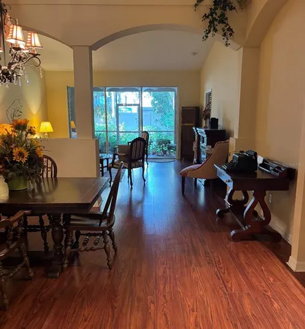 a view of a livingroom with furniture and a table