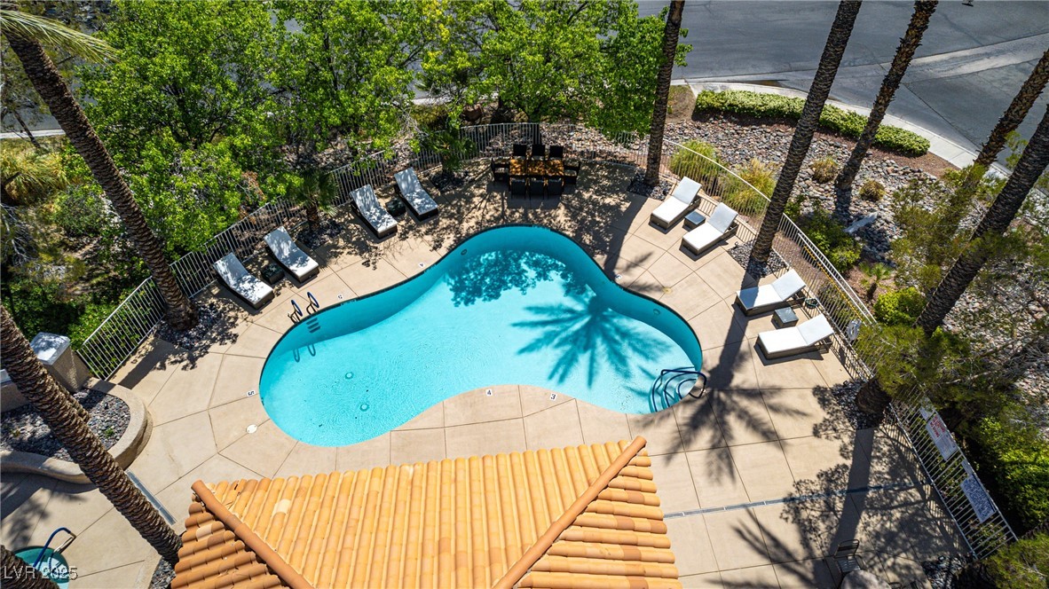 8541 Heather Downs Drive Las Vegas, NV 89113 - Photo 26 of 39 View of pool featuring a patio