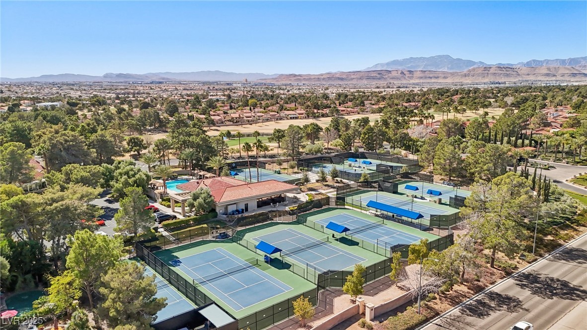 8541 Heather Downs Drive Las Vegas, NV 89113 - Photo 34 of 39 Aerial perspective of suburban area featuring a mo