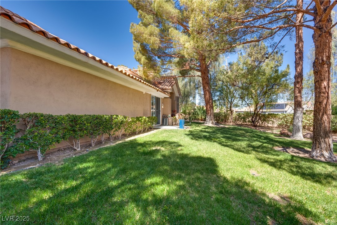 8541 Heather Downs Drive Las Vegas, NV 89113 - Photo 39 of 39 View of green lawn