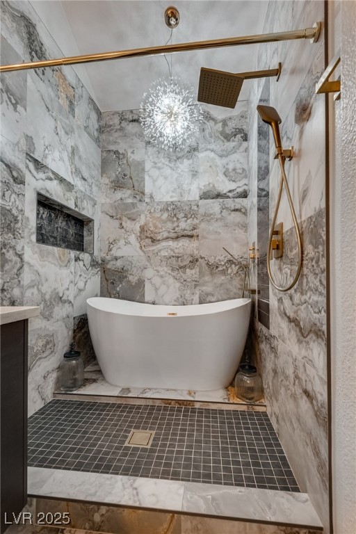 8541 Heather Downs Drive Las Vegas, NV 89113 - Photo 4 of 39 Bathroom with a soaking tub and a shower