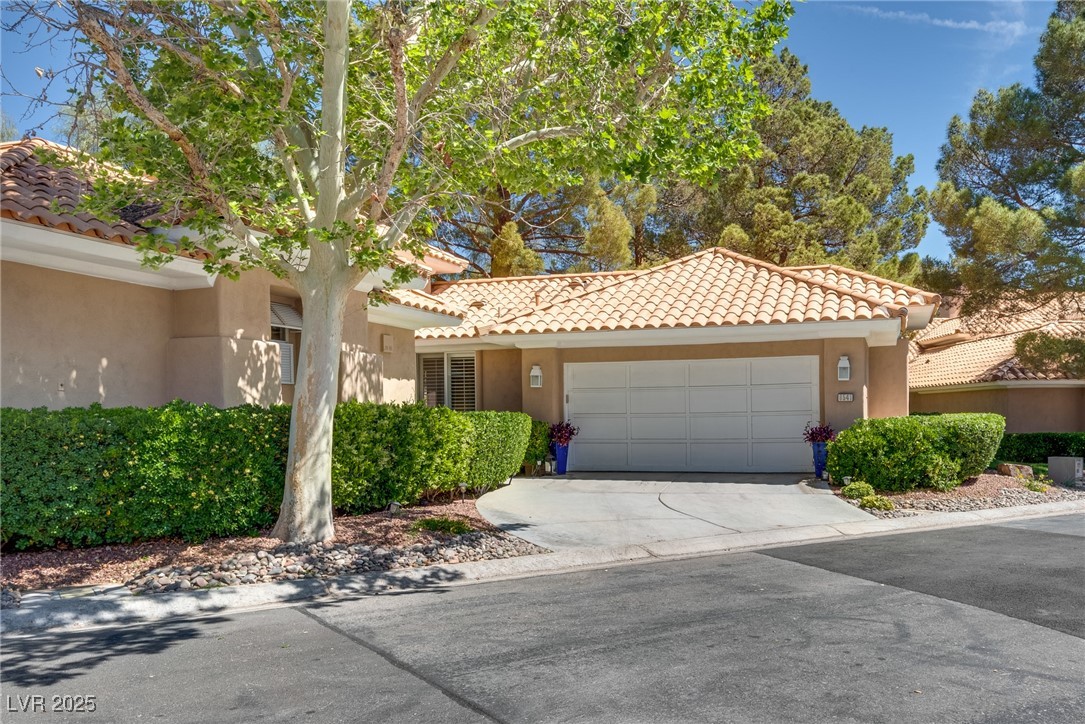 8541 Heather Downs Drive Las Vegas, NV 89113 - Photo 7 of 39 Mediterranean / spanish-style home featuring a til