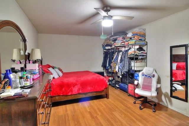 a view of a porch with table and chairs