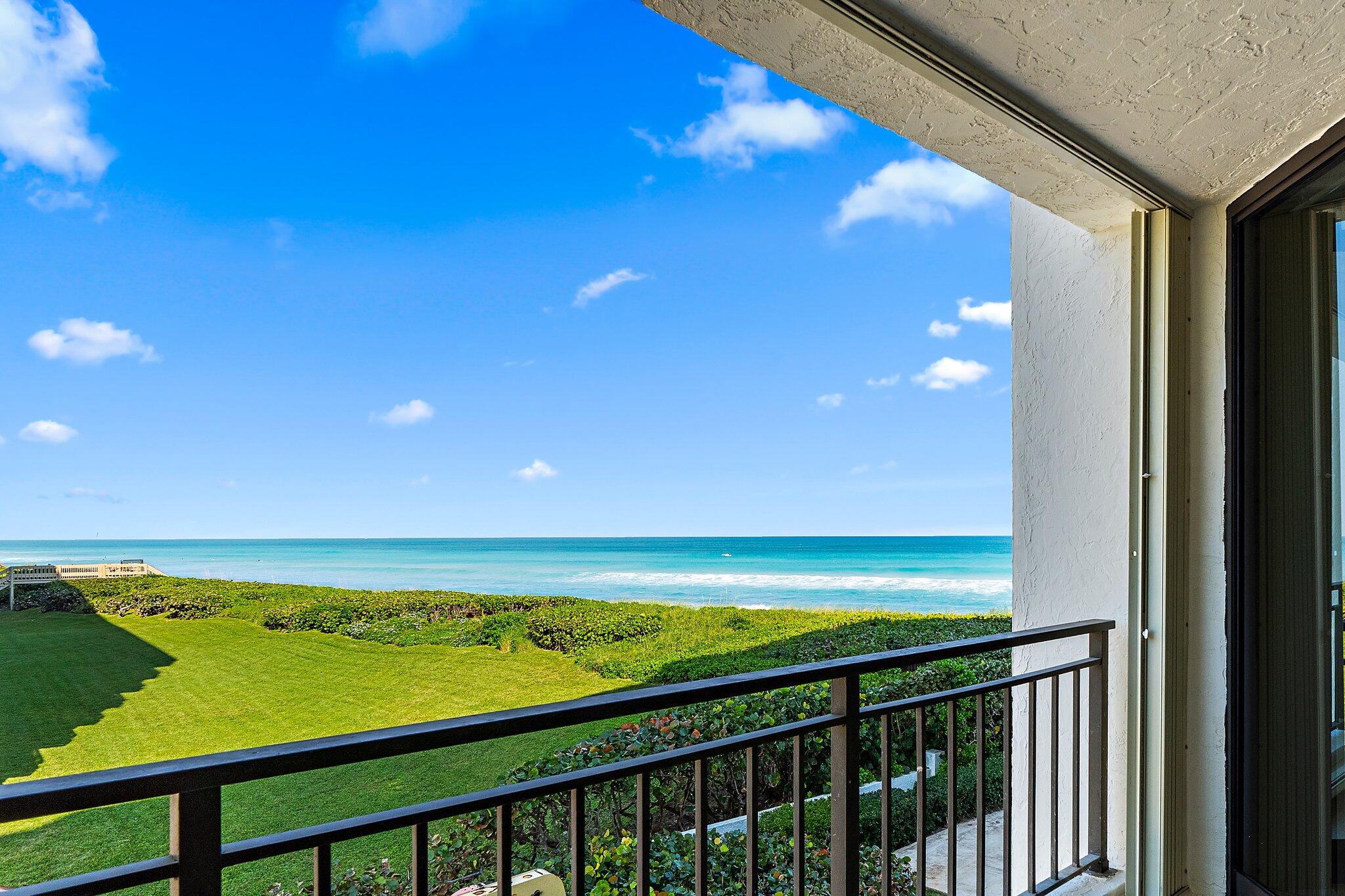 19850 South Beach Road, Unit 3D Jupiter, FL 33469 - Photo 17 of 54 a view of an ocean from a balcony