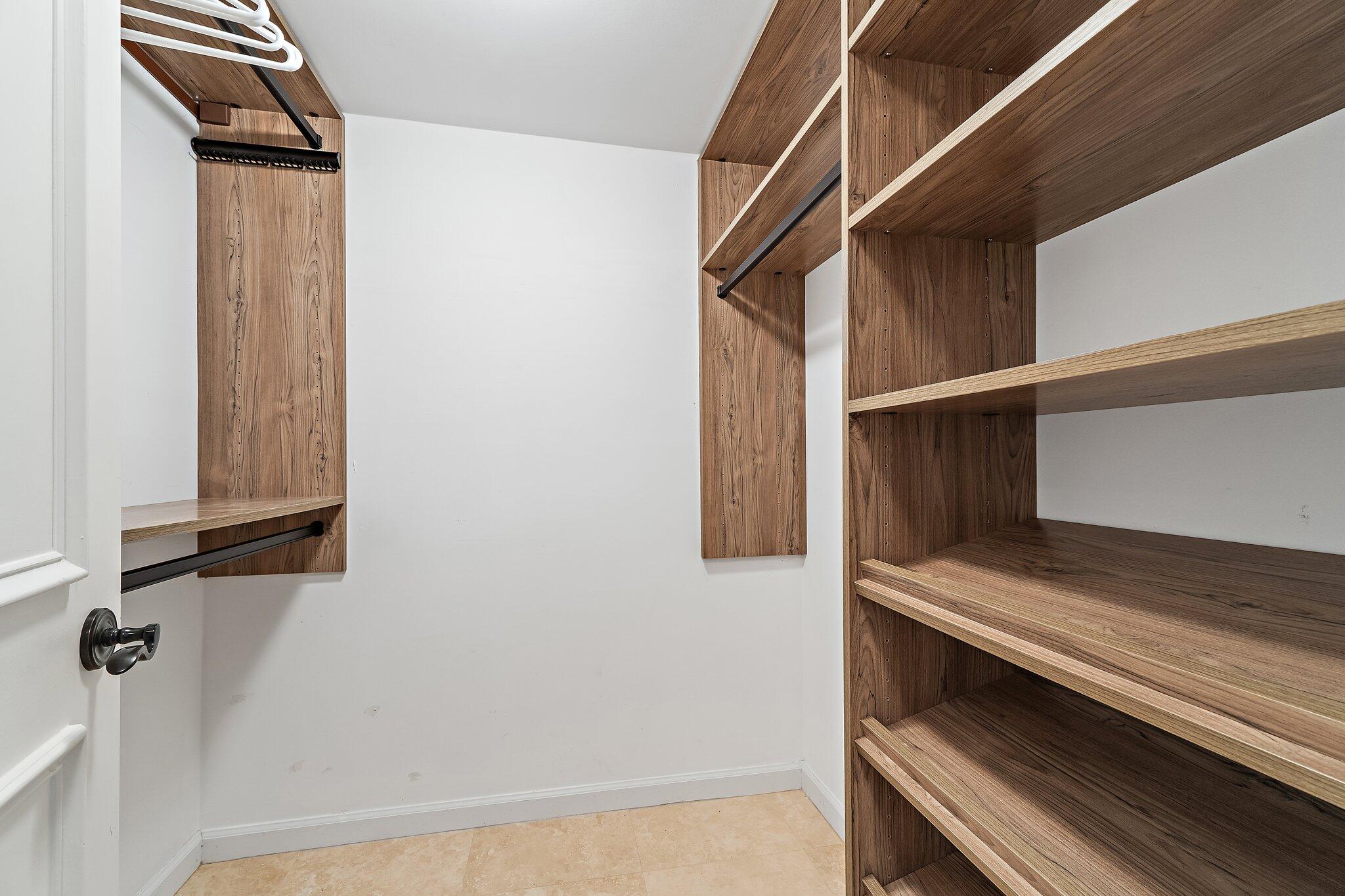 19850 South Beach Road, Unit 3D Jupiter, FL 33469 - Photo 43 of 54 a view of an empty walk in closet