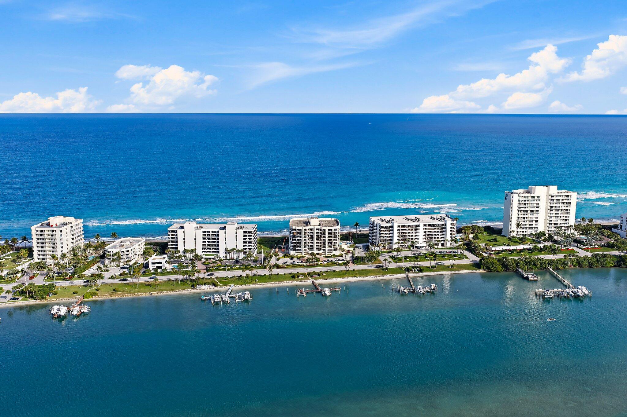 19850 South Beach Road, Unit 3D Jupiter, FL 33469 - Photo 53 of 54 a view of a lake with chairs