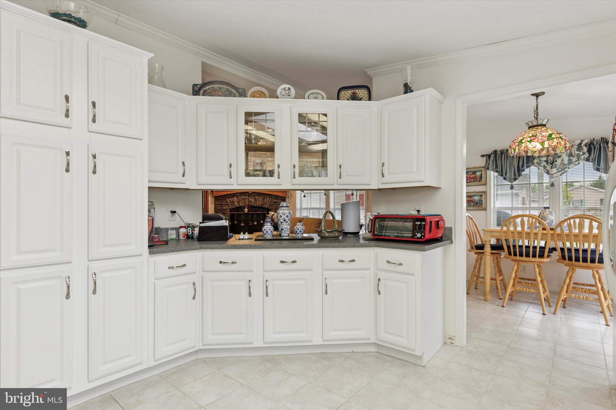 81 Random Road Douglassville, PA 19518 - Photo 11 of 31 a kitchen with white cabinets and sink