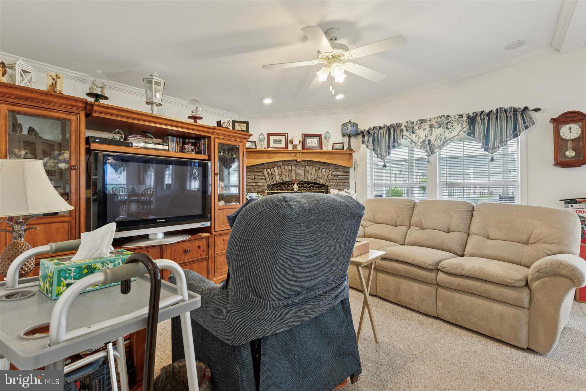 81 Random Road Douglassville, PA 19518 - Photo 12 of 31 a living room with furniture a flat screen tv and kitchen view