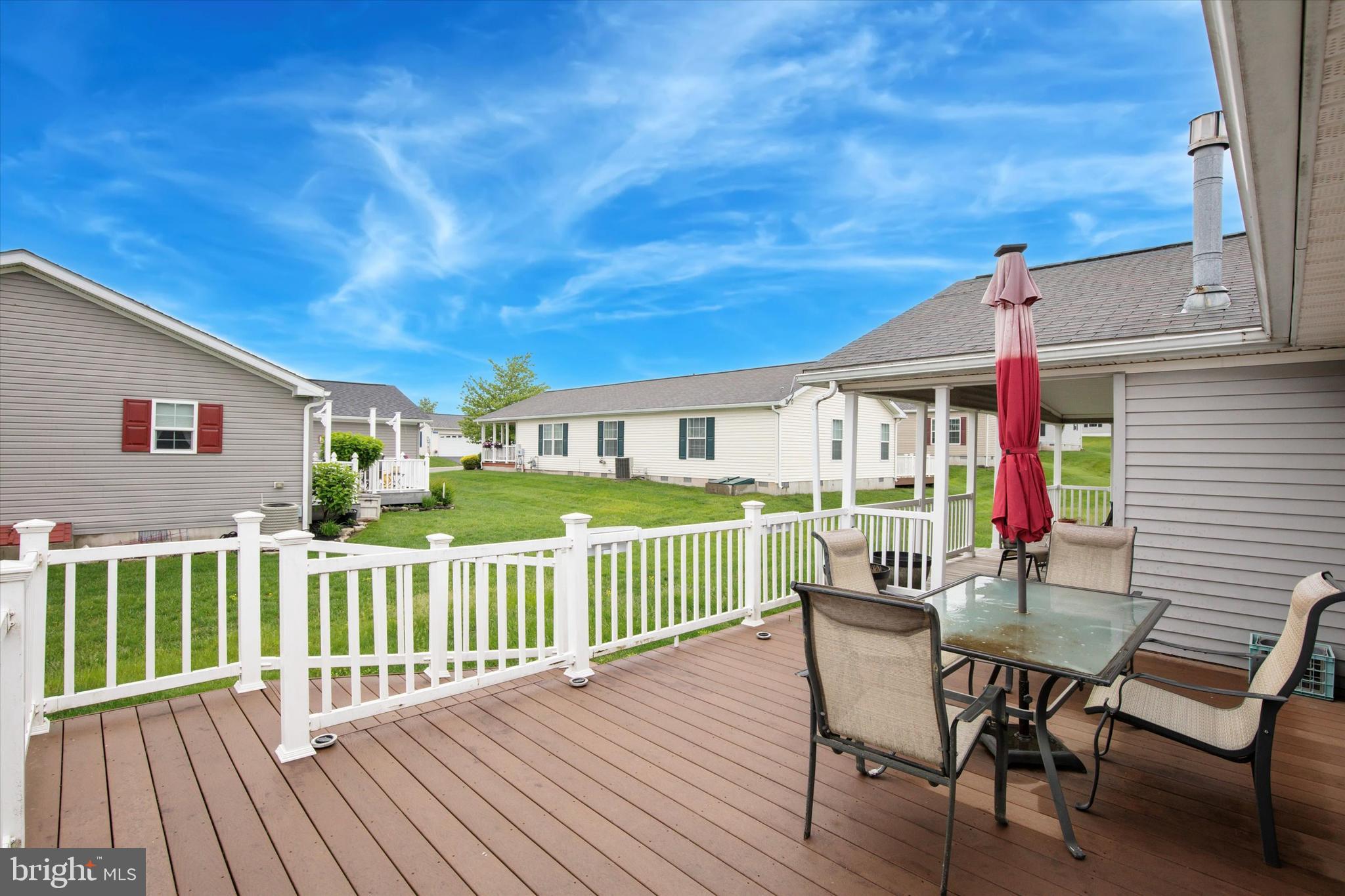 81 Random Road Douglassville, PA 19518 - Photo 27 of 31 a view of a house with a deck and furniture