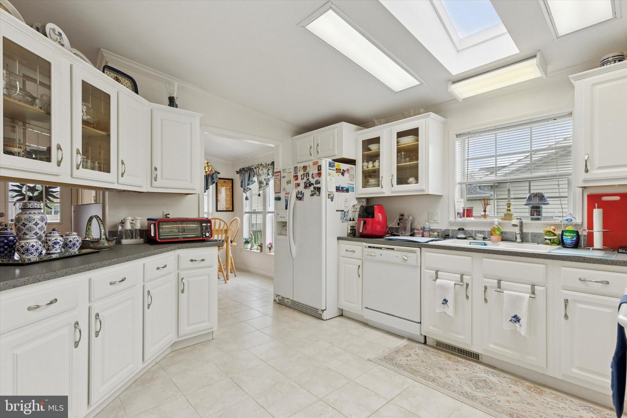 81 Random Road Douglassville, PA 19518 - Photo 8 of 31 a kitchen with granite countertop white cabinets and sink
