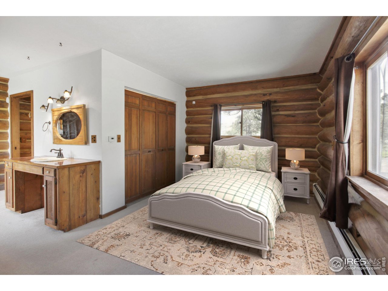 2657 Parrish Road Berthoud, CO 80513 - Photo 14 of 40 Main level primary bedroom