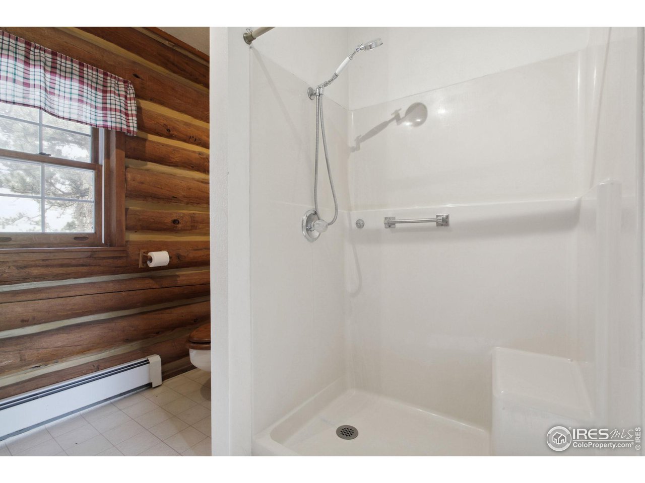 2657 Parrish Road Berthoud, CO 80513 - Photo 15 of 40 Main floor bath