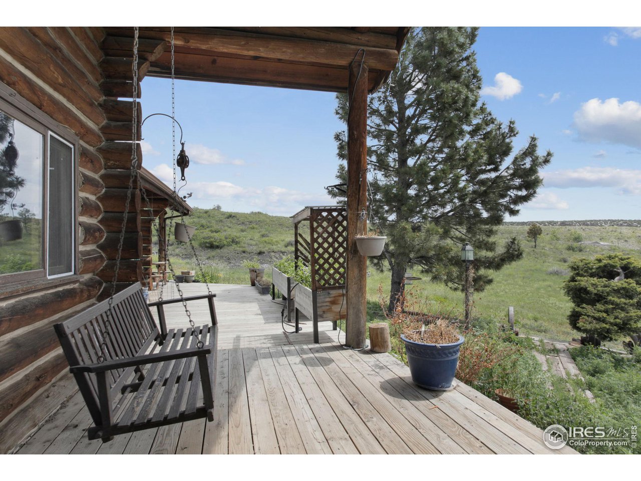 2657 Parrish Road Berthoud, CO 80513 - Photo 27 of 40 Front porch sittin'
