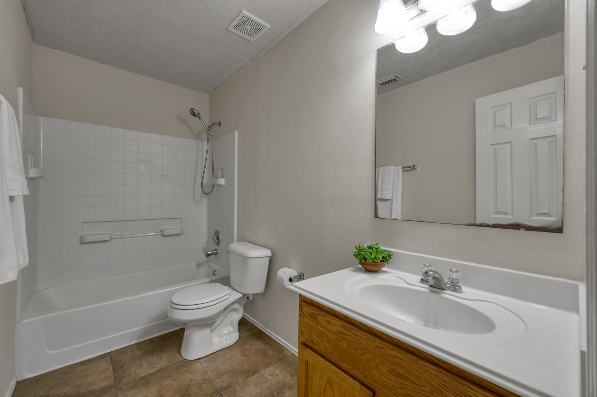 23919 Kingbriar Drive Spring, TX 77373 - Photo 29 of 33 The full secondary bathroom offers a shower/tub combination, generous vanity space, and a functional layout for everyday convenience.