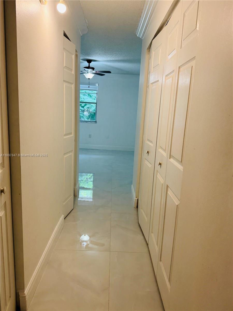 6961 Southwest 129th Avenue, Unit 7 Miami, FL 33183 - Photo 18 of 42 view of a room with door
