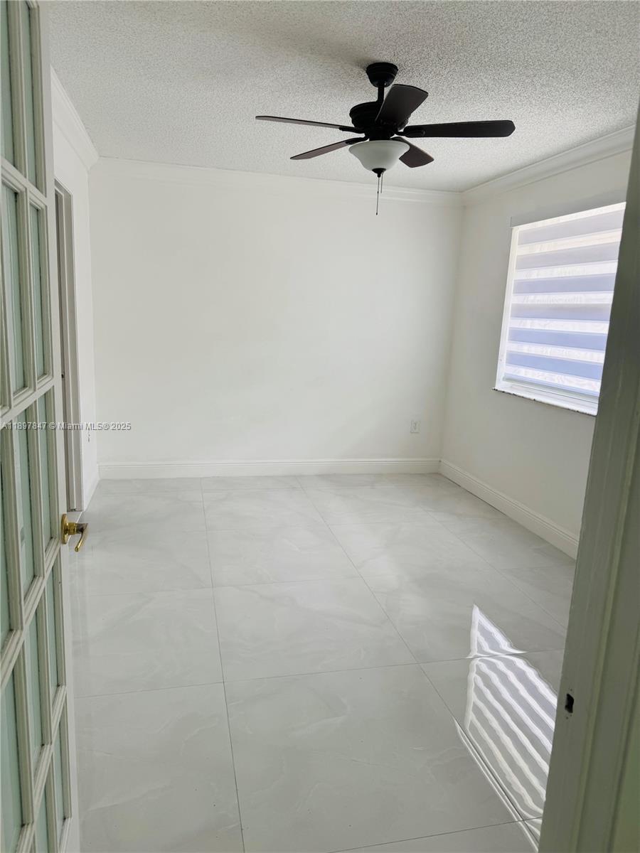 6961 Southwest 129th Avenue, Unit 7 Miami, FL 33183 - Photo 24 of 42 a view of room and hardwood floor