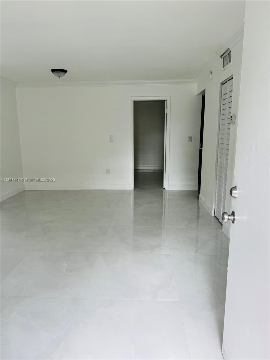 6961 Southwest 129th Avenue, Unit 7 Miami, FL 33183 - Photo 39 of 42 a view of an empty room