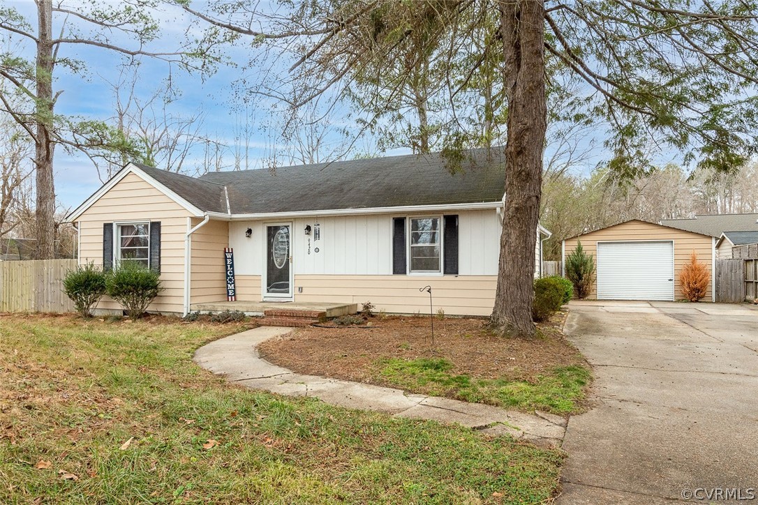 9420 Townsend Road Providence Forge, VA 23140 - Photo 1 of 29 a front view of a house with a yard and garage