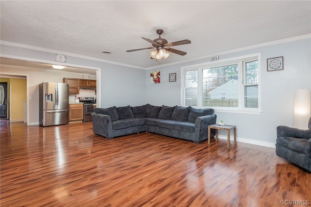 9420 Townsend Road Providence Forge, VA 23140 - Photo 11 of 29 a living room with furniture and a large window