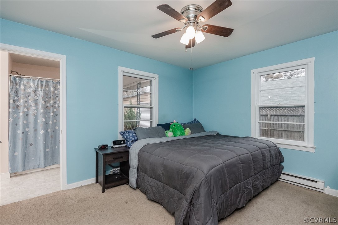 9420 Townsend Road Providence Forge, VA 23140 - Photo 17 of 29 a bedroom with a bed and a window